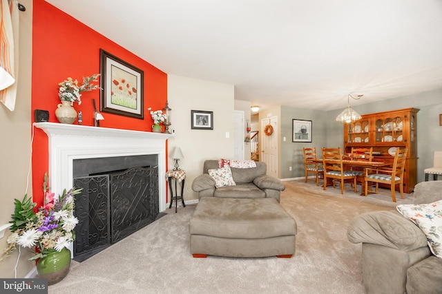 2751 Fynamore Ln, Downingtown, PA 19335 - carpeted living room with a chandelier, a fireplace with flush hearth, and stairs