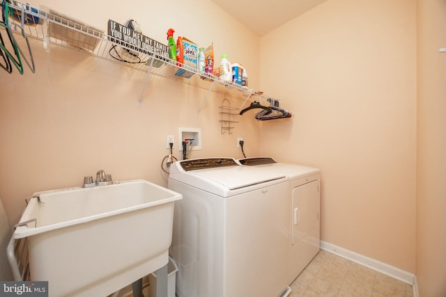 2751 Fynamore Ln, Downingtown, PA 19335 - washroom featuring washer and clothes dryer and baseboards