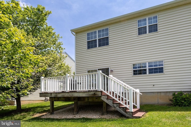 2751 Fynamore Ln, Downingtown, PA 19335 - back of house featuring a wooden deck and a lawn