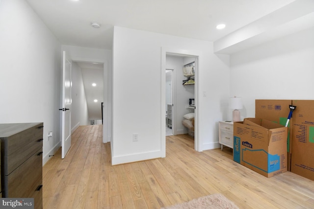 1427 K St SE, Washington, DC 20003 - bedroom with light wood finished floors, a walk in closet, a closet, and recessed lighting