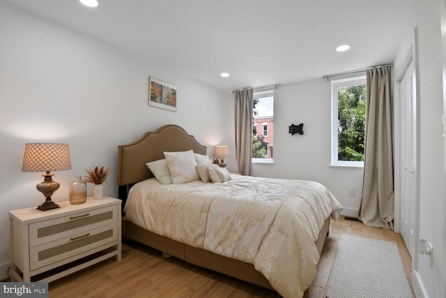1427 K St SE, Washington, DC 20003 - bedroom with light wood-type flooring and recessed lighting