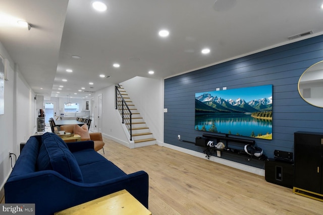 1427 K St SE, Washington, DC 20003 - living area featuring stairway, recessed lighting, wood finished floors, and wood walls