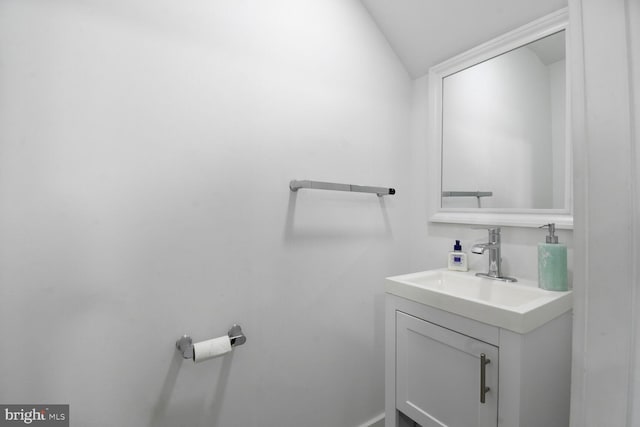 1427 K St SE, Washington, DC 20003 - bathroom with vanity and vaulted ceiling