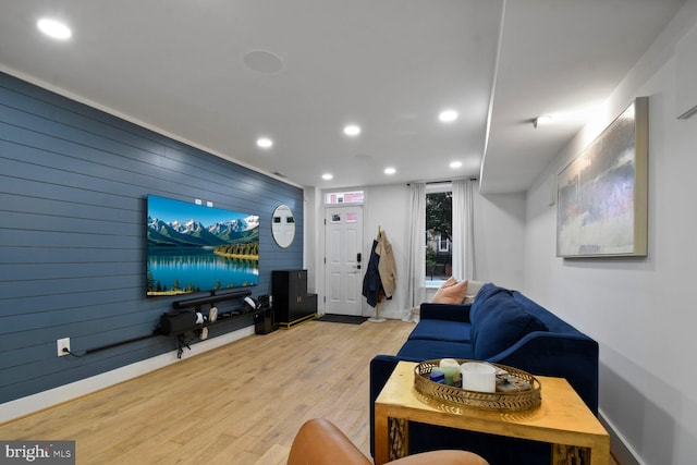 1427 K St SE, Washington, DC 20003 - living area featuring wood finished floors, wood walls, and recessed lighting