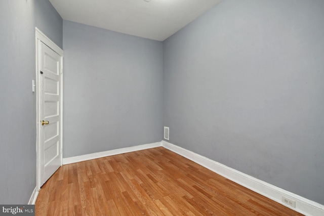 736 Bartlett Ave, Baltimore, MD 21218 - spare room with light wood finished floors and baseboards