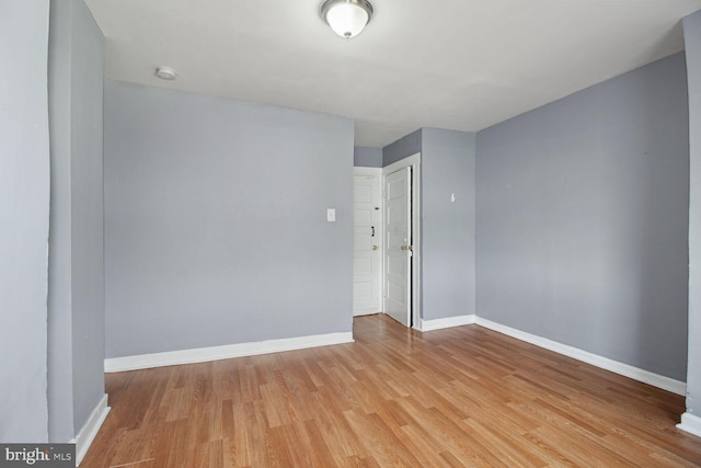 736 Bartlett Ave, Baltimore, MD 21218 - unfurnished room with light wood-style flooring and baseboards