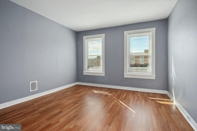 736 Bartlett Ave, Baltimore, MD 21218 - empty room featuring baseboards and wood finished floors