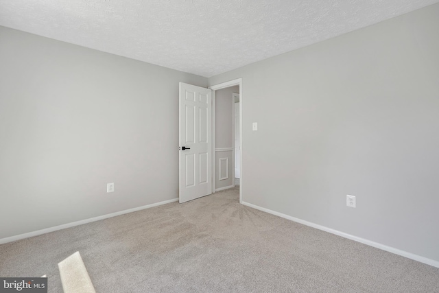 7728 Barnstable Pl, Rockville, MD 20855 - empty room featuring light carpet and a textured ceiling