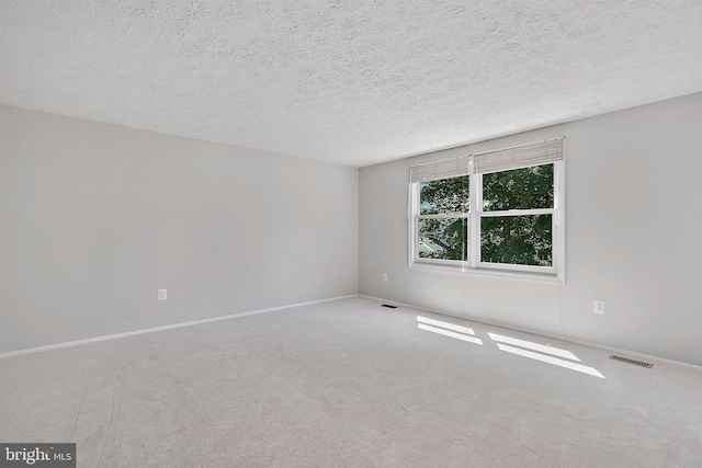 7728 Barnstable Pl, Rockville, MD 20855 - carpeted empty room featuring a textured ceiling and baseboards