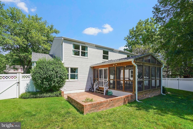 7728 Barnstable Pl, Rockville, MD 20855 - rear view of house featuring a sunroom, a fenced backyard, a shingled roof, a gate, and a patio area