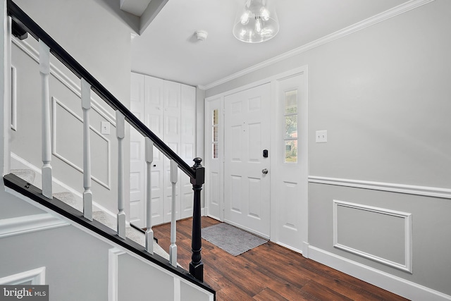 7728 Barnstable Pl, Rockville, MD 20855 - entryway featuring stairs, dark wood finished floors, ornamental molding, and a chandelier