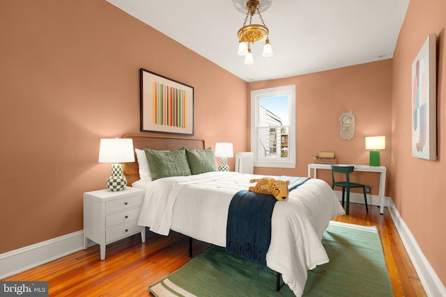 61 W St NW, Washington, DC 20001 - bedroom with wood finished floors and radiator heating unit
