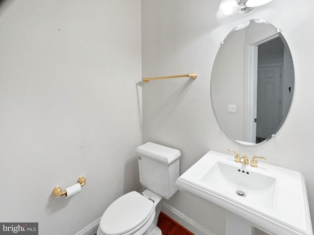 12054 Greatbridge Rd, Woodbridge, VA 22192 - bathroom with toilet and baseboards