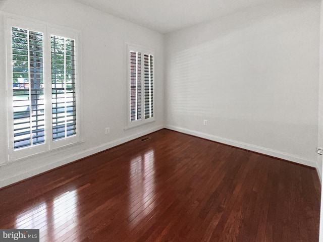 12054 Greatbridge Rd, Woodbridge, VA 22192 - empty room featuring dark wood-style floors