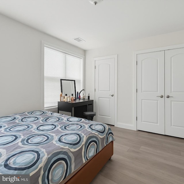 3104 N Broad St, Philadelphia, PA 19132 - bedroom featuring light wood-type flooring and a closet