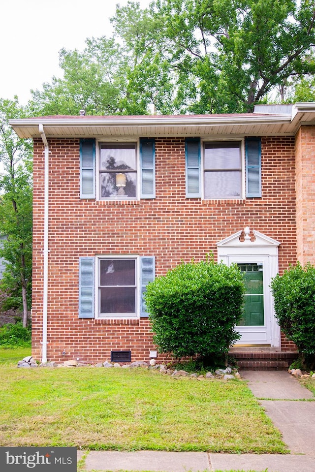 208 Farrell Ln, Fredericksburg, VA 22401 - view of front of property featuring brick siding and a front lawn
