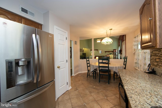 9 Stirrup Way, Burlington, NJ 08016 - kitchen featuring stainless steel fridge, brown cabinetry, decorative light fixtures, light tile patterned floors, and a chandelier