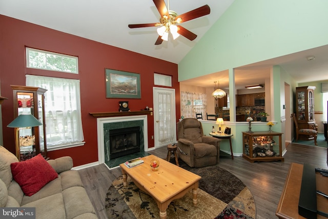 9 Stirrup Way, Burlington, NJ 08016 - living area with high vaulted ceiling, a ceiling fan, a fireplace, and wood finished floors