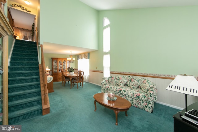 9 Stirrup Way, Burlington, NJ 08016 - living room with carpet floors, stairs, plenty of natural light, a chandelier, and wainscoting