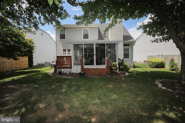 9 Stirrup Way, Burlington, NJ 08016 - rear view of house with a sunroom, a shingled roof, and a chimney
