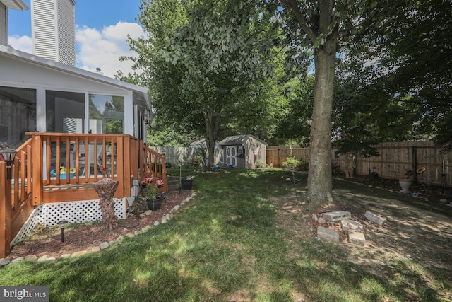 9 Stirrup Way, Burlington, NJ 08016 - fenced backyard with a sunroom, a storage unit, and a deck