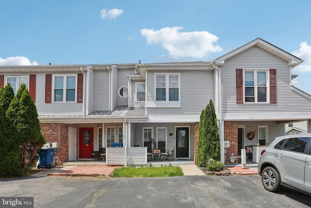 116 Lake Arrowhead Cir, Bear, DE 19701 - view of property with brick siding and covered porch
