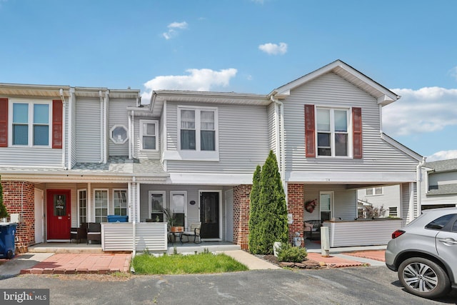116 Lake Arrowhead Cir, Bear, DE 19701 - view of property featuring covered porch and brick siding