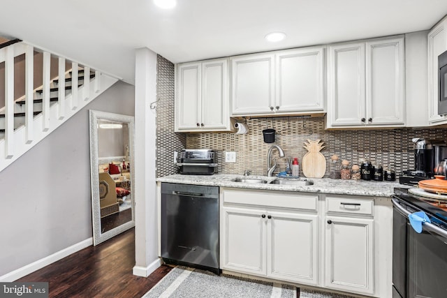116 Lake Arrowhead Cir, Bear, DE 19701 - kitchen featuring dishwasher, dark wood-style floors, backsplash, range with electric cooktop, and white cabinets