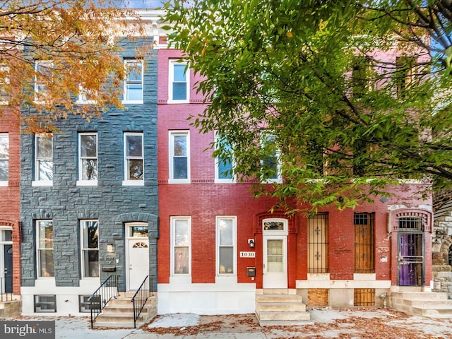 1030 N Fulton Ave, Baltimore, MD 21217 - view of property with entry steps and stone siding