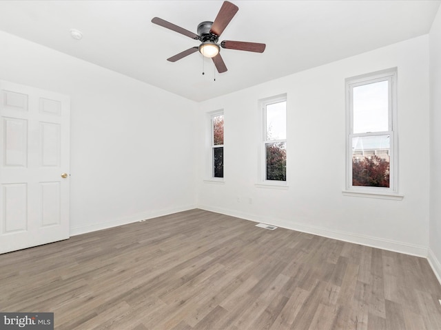 1030 N Fulton Ave, Baltimore, MD 21217 - empty room featuring light wood finished floors and ceiling fan