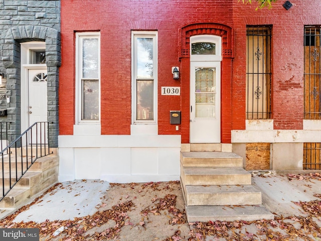 1030 N Fulton Ave, Baltimore, MD 21217 - doorway to property featuring stone siding