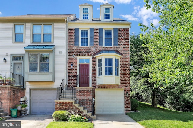 8916 Rosewood Way, Jessup, MD 20794 - multi unit property with an attached garage, driveway, and brick siding