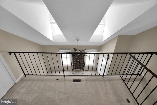 8916 Rosewood Way, Jessup, MD 20794 - staircase featuring a skylight, ceiling fan, and carpet