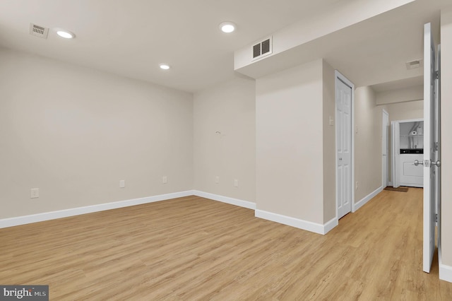 8916 Rosewood Way, Jessup, MD 20794 - empty room featuring light wood-style flooring and recessed lighting