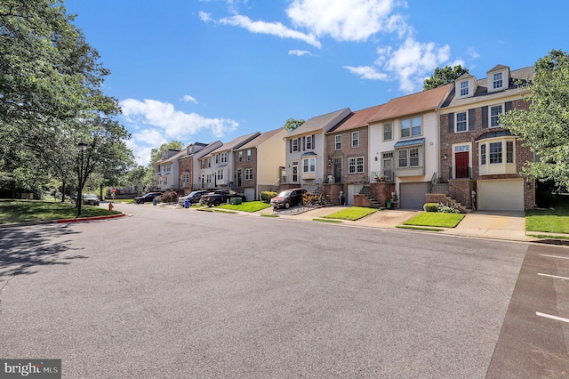 8916 Rosewood Way, Jessup, MD 20794 - view of asphalt road with a residential view, street lighting, curbs, and sidewalks