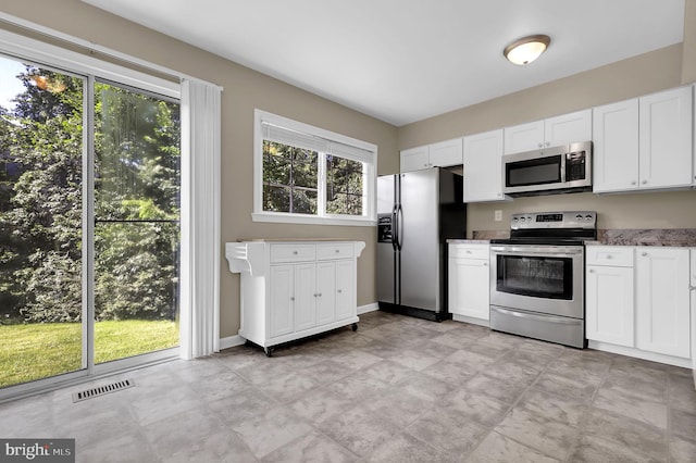 8916 Rosewood Way, Jessup, MD 20794 - kitchen with stainless steel appliances and white cabinetry