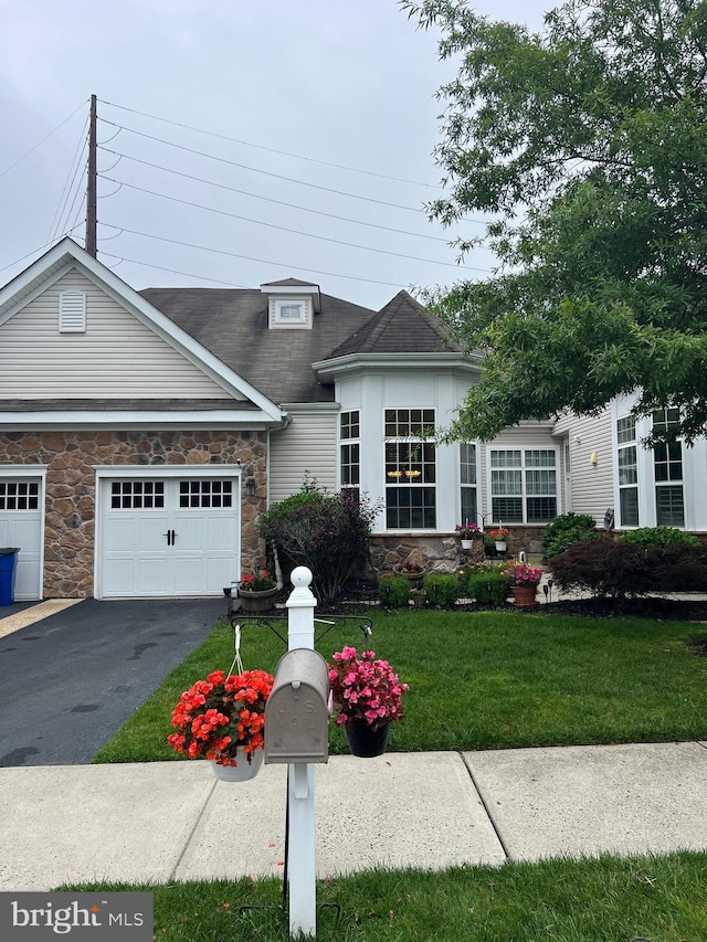 86 Ables Run Dr, Absecon, NJ 08201 - view of front facade with a garage, stone siding, driveway, and a front lawn