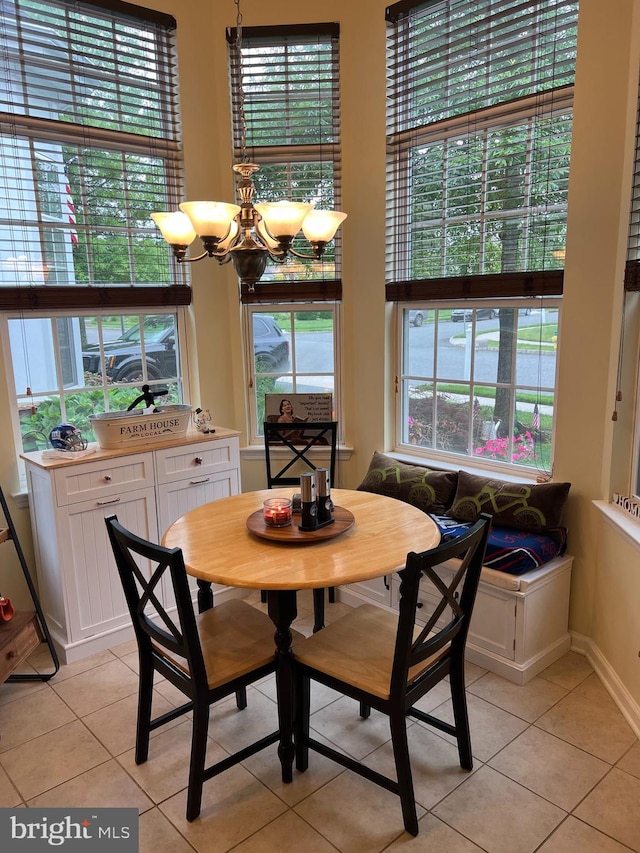 86 Ables Run Dr, Absecon, NJ 08201 - dining area with a chandelier, light tile patterned floors, and plenty of natural light