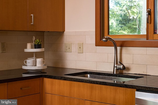 33 Sergeant St, Princeton, NJ 08540 - kitchen featuring backsplash and dark countertops