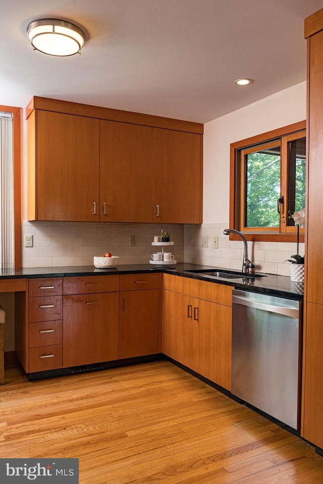 33 Sergeant St, Princeton, NJ 08540 - kitchen with stainless steel dishwasher, dark countertops, tasteful backsplash, light wood-style flooring, and recessed lighting