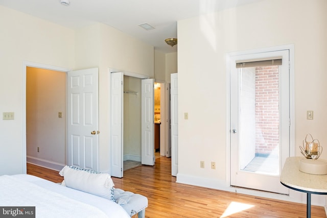 33 Sergeant St, Princeton, NJ 08540 - bedroom featuring light wood-style floors, multiple windows, and access to outside
