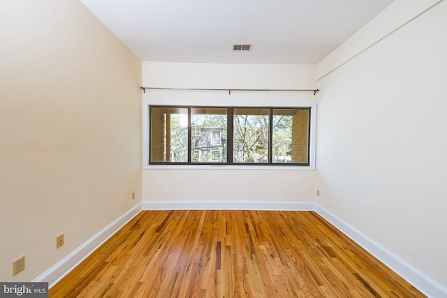 33 Sergeant St, Princeton, NJ 08540 - empty room with wood finished floors and baseboards