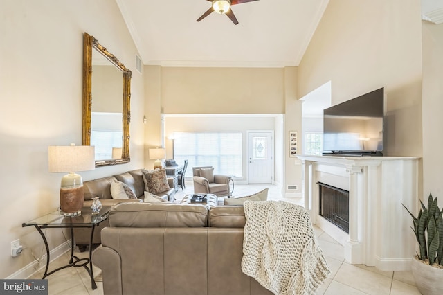 1 Springfield Ave, Berlin, NJ 08009 - living area with a ceiling fan, ornamental molding, tile patterned flooring, and a fireplace