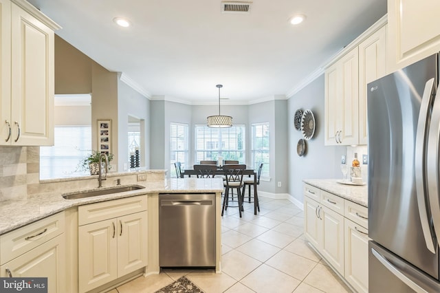1 Springfield Ave, Berlin, NJ 08009 - kitchen featuring stainless steel appliances, light tile patterned floors, a peninsula, light stone countertops, and recessed lighting