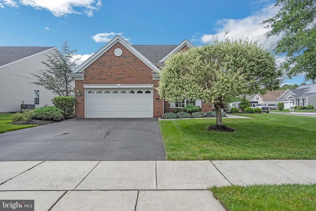 1 Springfield Ave, Berlin, NJ 08009 - view of front of property featuring driveway, brick siding, a front lawn, and a garage