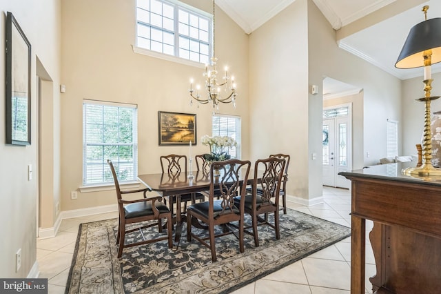 1 Springfield Ave, Berlin, NJ 08009 - dining space with crown molding, light tile patterned flooring, a chandelier, and a high ceiling