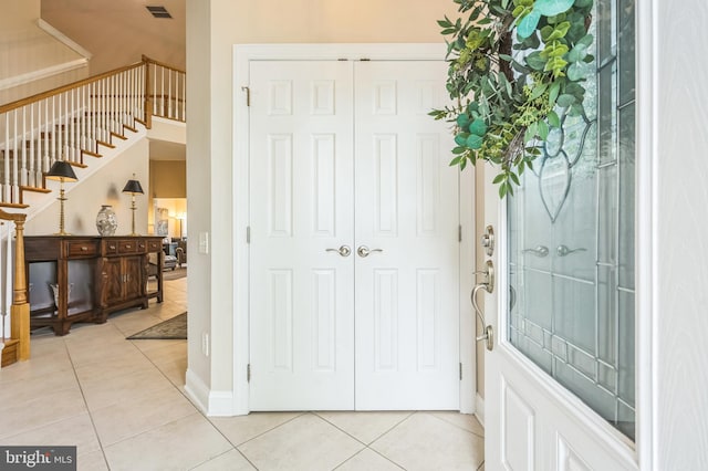 1 Springfield Ave, Berlin, NJ 08009 - entryway featuring light tile patterned flooring and stairway