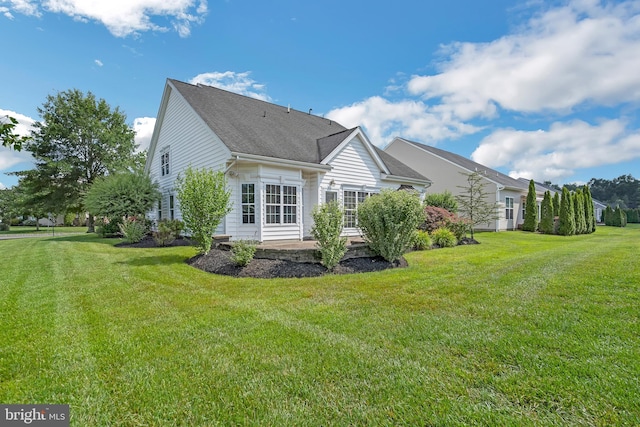 1 Springfield Ave, Berlin, NJ 08009 - view of side of property with a lawn and a patio area
