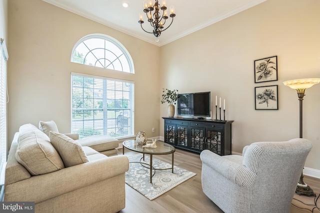 1 Springfield Ave, Berlin, NJ 08009 - living room featuring a chandelier, crown molding, and wood finished floors
