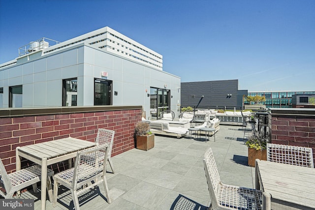 37 L St SE Unit 101, Washington, DC 20003 - view of patio featuring an outdoor living space and outdoor dining space